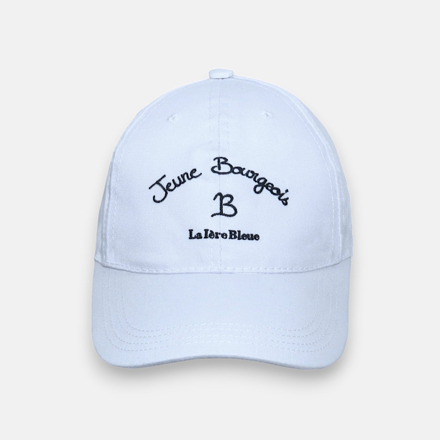 LA IÈRE BLEUE- CASQUETTE BLANCHE ET BLEUE FONCÉ